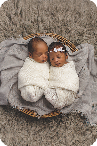 twin newborn babies sleeping