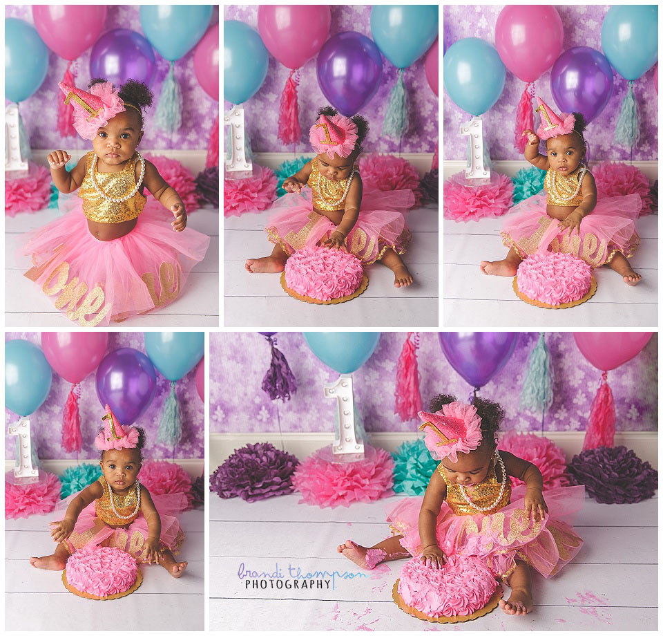 bright pink cake smash photography session in studio with one year old girl