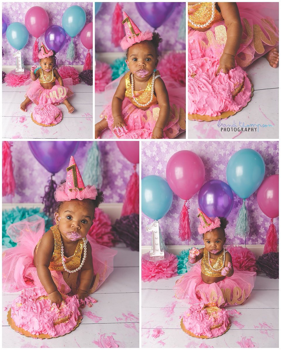 bright pink cake smash photography session in studio with one year old girl