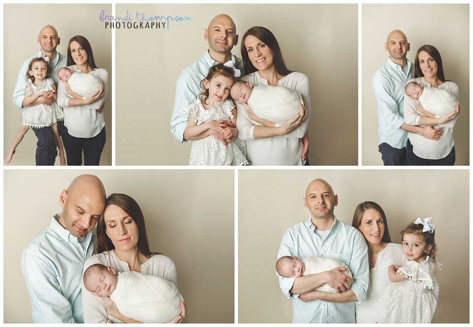 newborn photography with dad, mom and toddler sister